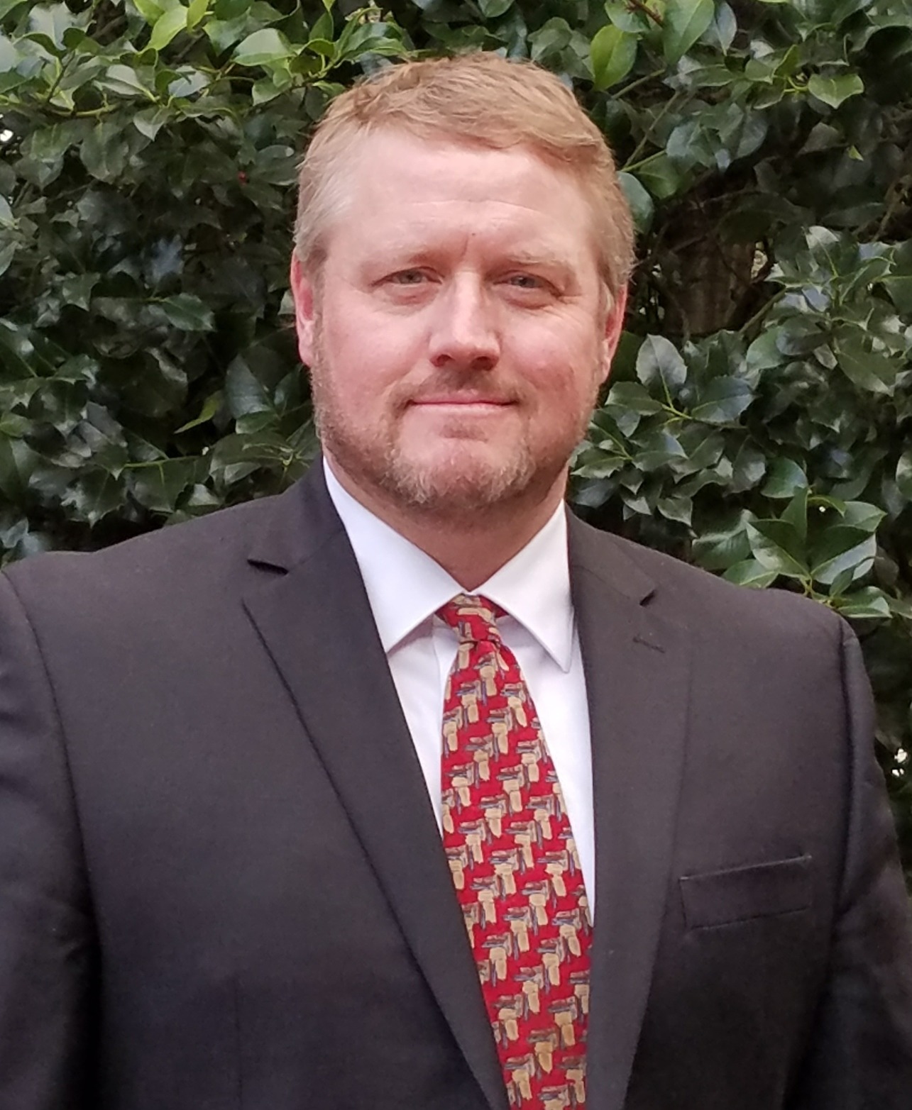 man in suit and tie outside