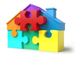 puzzle pieces in shape of house reflect landlord tenant law in oregon