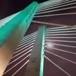 tilikum crossing bridge architecture with full moon peering through